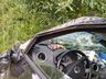 Carro sai da pista e tomba na SC 163 em Iporã do Oeste