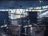 Bombeiros trabalham no rescaldo do incêndio no Super Vipi Center