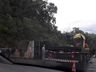 Carreta sai da pista e tomba às margens da BR 163 em São José do Cedro