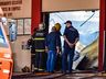 Bombeiros trabalham no rescaldo do incêndio no Super Vipi Center