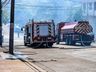 Bombeiros trabalham no rescaldo do incêndio no Super Vipi Center