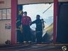 Bombeiros trabalham no rescaldo do incêndio no Super Vipi Center