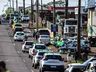 Ao som do Hino Nacional manifestantes realizam parada no trevo da BR-282 