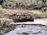 Enchente leva ponte no interior de Tunápolis