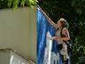 Artista pinta mural em homenagem aos 67 anos de São Miguel do Oeste 