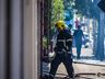 Bombeiros trabalham no rescaldo do incêndio no Super Vipi Center