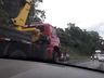 Carreta sai da pista e tomba às margens da BR 163 em São José do Cedro