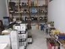 Passagem secreta em depósito de SC escondia armas e vinhos