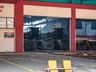 Bombeiros trabalham no rescaldo do incêndio no Super Vipi Center