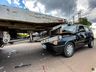 Mulher colide com carro em traseira de caminhão na Willy Barth