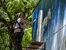 Artista pinta mural em homenagem aos 67 anos de São Miguel do Oeste 