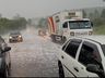 Chuva forte acompanhada de granizo e ventos alaga ruas e causa transtornos em SC