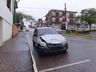 Veículo capota no centro da cidade após colidir com outro carro