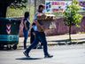 Bombeiros trabalham no rescaldo do incêndio no Super Vipi Center