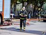 Bombeiros trabalham no rescaldo do incêndio no Super Vipi Center
